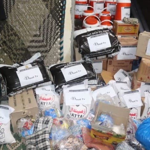 Flour, bedding and supplies packed and labelled for families