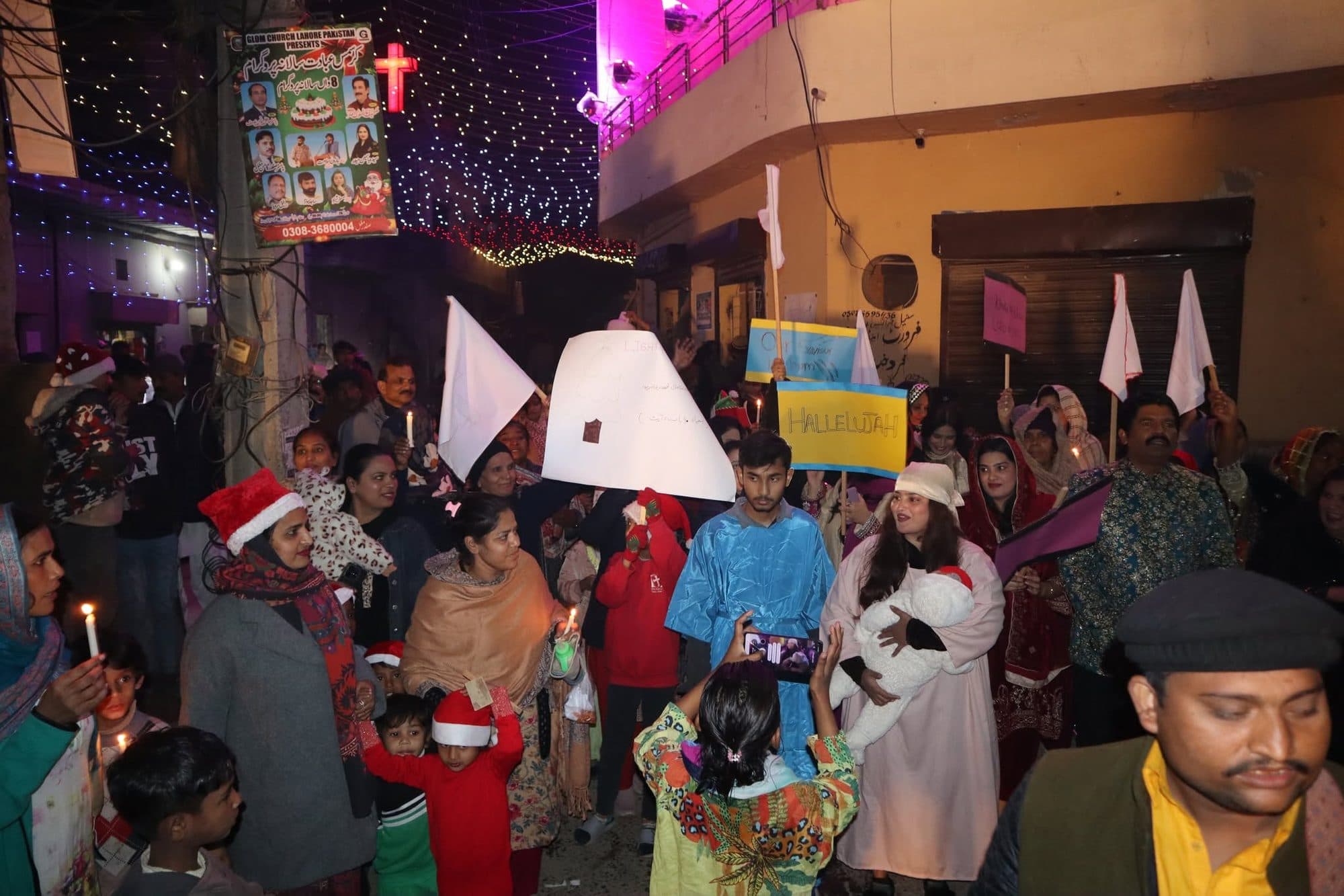 Mary and Joseph leading the nativity at the front of the Christmas procession
